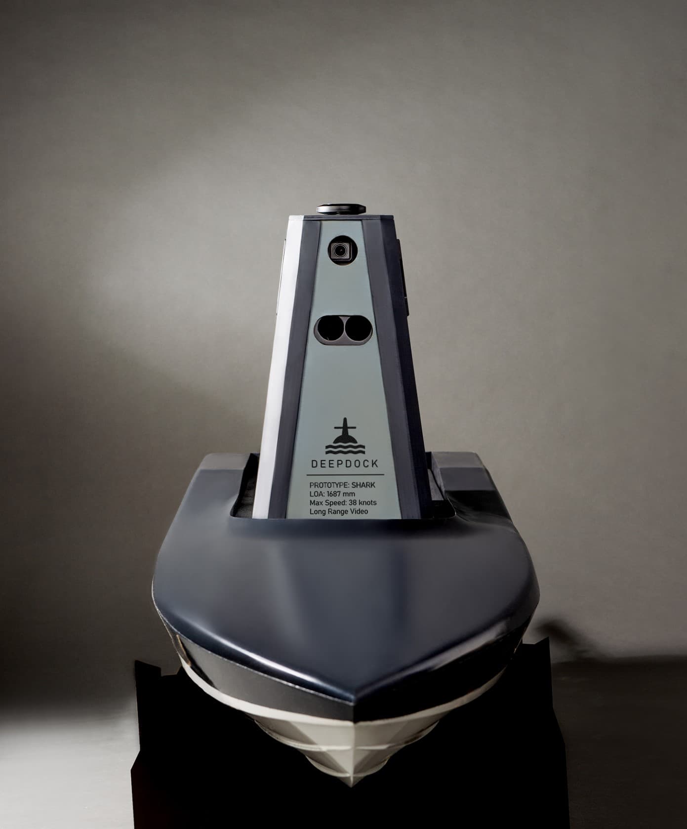 DEEPDOCK Shark prototype autonomous surface vessel — bow-on studio shot